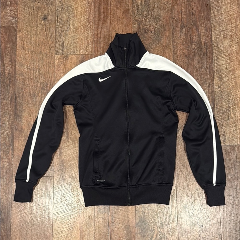 WOMENS NIKE DRI FIT TRAVK ZIP JACKET